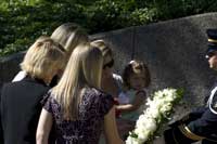 Ford's family lays wreath
